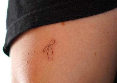 Fineline-Schleife am Arm