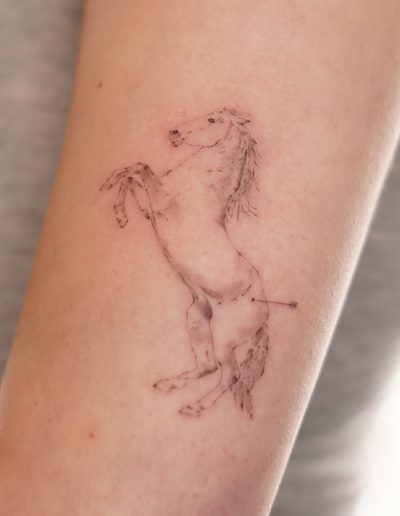 Tattoo eines Mustangs (Pferd)